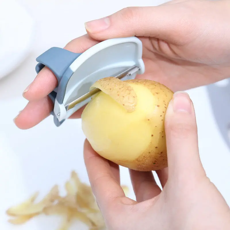 Multi-Function Kitchen Peeler – Slicer, Grater & Shredder For Vegetables & Fruits 1