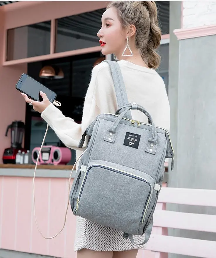 Spacious Diaper Backpack – Stylish Nursing & Travel Bag For Moms And Caregivers 1